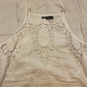 its a kendall and kylie shirt with a lace frontand cute for over swimsuit